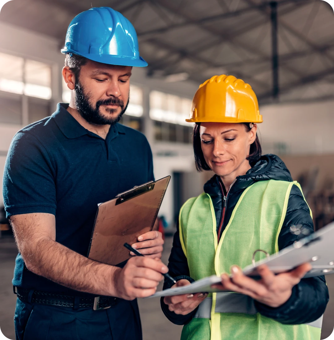 Construction workers reviewing plans